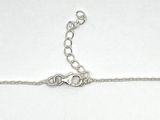 silver plated chain bracelet with a heart charm on a white background