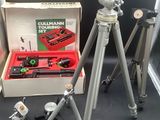 a tripod with a tripod and a camera on it