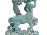statue of a horse and a man playing a flute on a white background