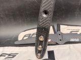 a close up of a pair of scissors on the seat of a car