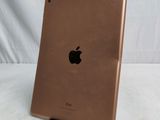 a close up of an ipad on a table with a white background
