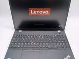 a laptop with a lenovo logo on the screen