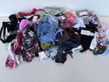 a pile of clothing that is sitting on the floor