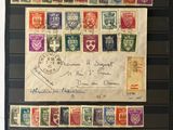 an old postcard with a lot of different stamps on it