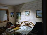 a bedroom with a bed and a television in it