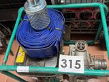 a green cart with a blue hose and a blue hose on it