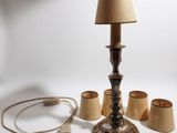 a lamp that is sitting on a table next to some lamps