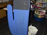a large blue object in the middle of a store