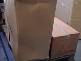 a stack of boxes on a pallet in a warehouse