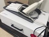 a box with a wii remote and a wii controller on top of it