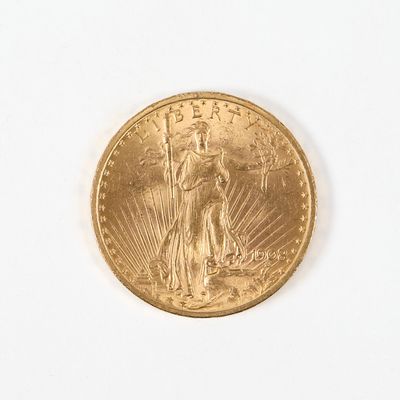 une image d'une pièce d'or sur une surface blanche