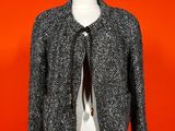 a black and white jacket on a mannequin mannequin mannequin mannequin mannequin mannequin mannequin mannequin mann