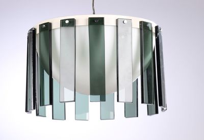 a light that is hanging from the ceiling in the room