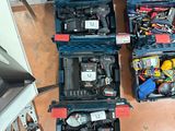 many tools in the case on the floor next to each other
