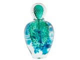 a glass bottle with a blue and green design on it