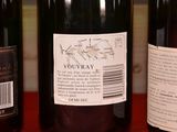 three bottles of wine that are on a table