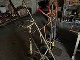 a hand truck that is sitting in the middle of a room