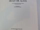 a book with a picture of a dead or alive on it