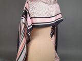 a pink and black scarf on a mannequin mannequin mannequin mannequin mannequin mannequin mannequin mannequin mann