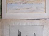 two pictures on the wall of a room one is a sailboat and the other is a sailboat