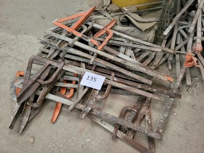 a pile of old tools that are sitting on the ground