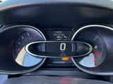a close up of a car dashboard with a speedometer and gauges
