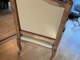 a chair that is sitting on a hard wood floor