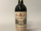a bottle of wine that is sitting on a table