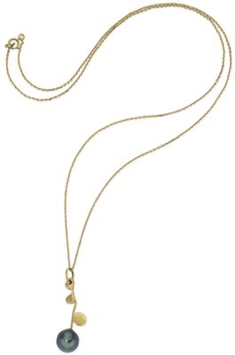 a necklace with a black pearl and a gold chain