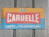 a sign on the side of a building that says carduele