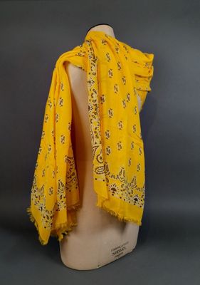 an image of a yellow scarf on a mannequin head
