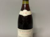 a bottle of wine that is sitting on a table