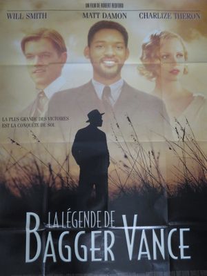 affiche de cinéma représentant un homme debout dans un champ d'herbes hautes