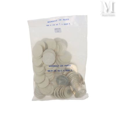 a bag of coins sitting on top of a table