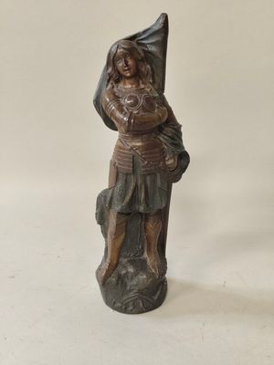 an image of a statue of a woman holding a baby