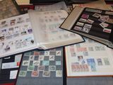 many different types of stamps on the pages of a book