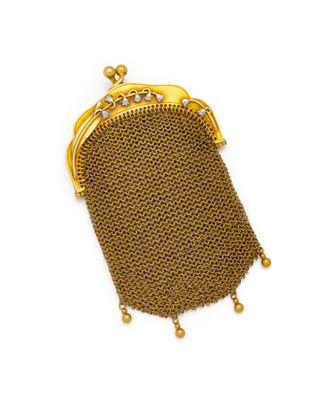 an antique gold mesh purse with a chain handle