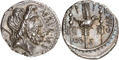 a silver coin with an image of a man on it