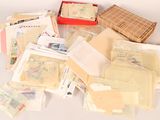 many different types of envelopes on the table