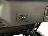 a close up of a car ' s dashboard with a remote control