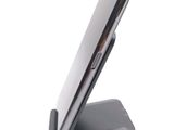 a close up of a cell phone on a stand