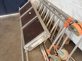 a bunch of luggage carts that are sitting on the ground