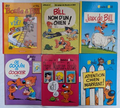 plusieurs livres pour enfants sont alignés sur une surface blanche
