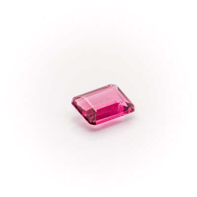 a pink tourmaline gems on a white background