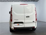 a white van that is parked in a room