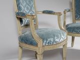 pair of louis xvi style armchairs with upholstered upholstered arms
