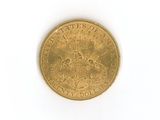 an image of a gold coin on a white surface