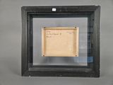 framed photograph of a piece of paper with writing in a black frame