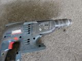 a drill that is laying on the ground