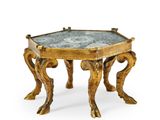 une petite table avec un plateau en marbre et des pieds en laiton
